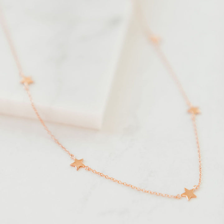 Chloe + Lois Falling Star Necklace in Rose Gold