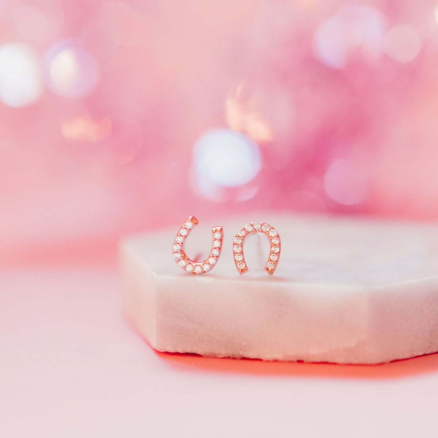 Chloe + Lois Lil Bit of Luck Horseshoe Stud Earrings in Rose Gold