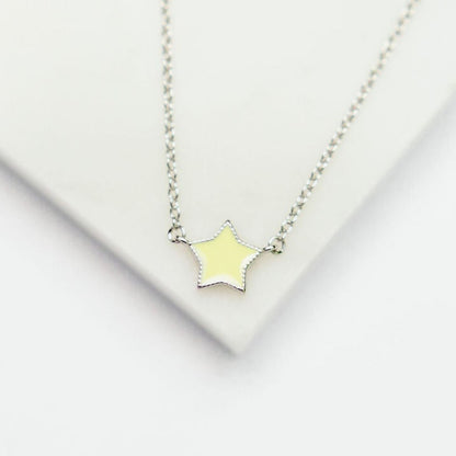 CHLOE + LOIS DAINTY STAR NECKLACE IN YELLOW