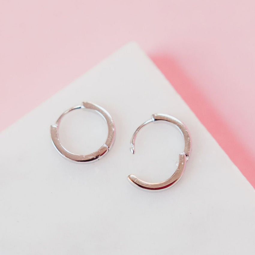 CHLOE + LOIS PINK OPAL HUGGIE HOOPS IN STERLING SILVER