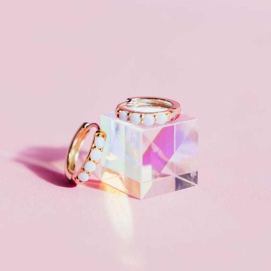 Chloe + Lois White Opal Huggie Hoops in 14K Gold